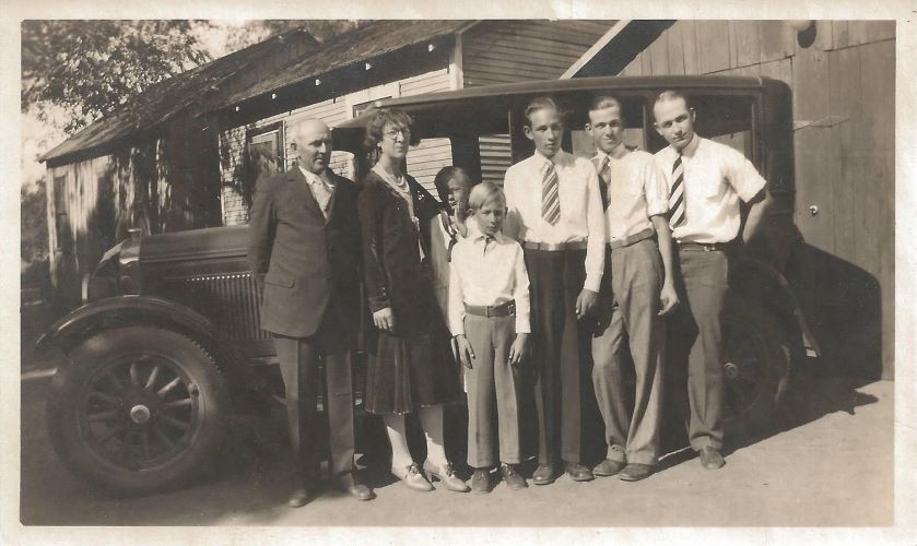 Image of Bates Family with a car